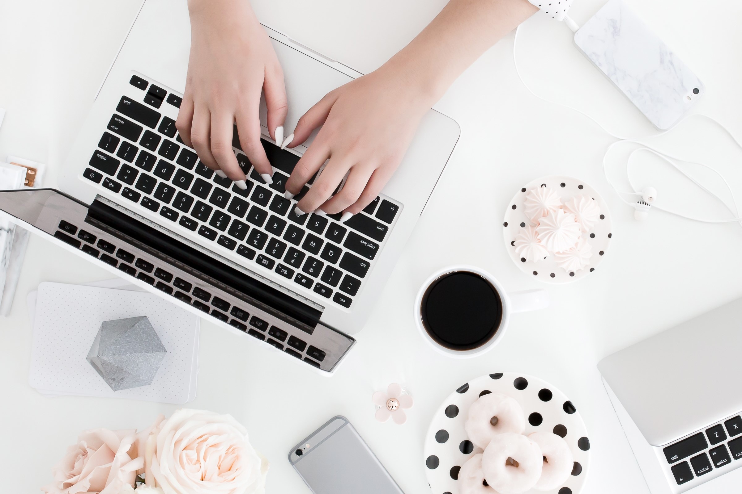 Woman typing on a laptop