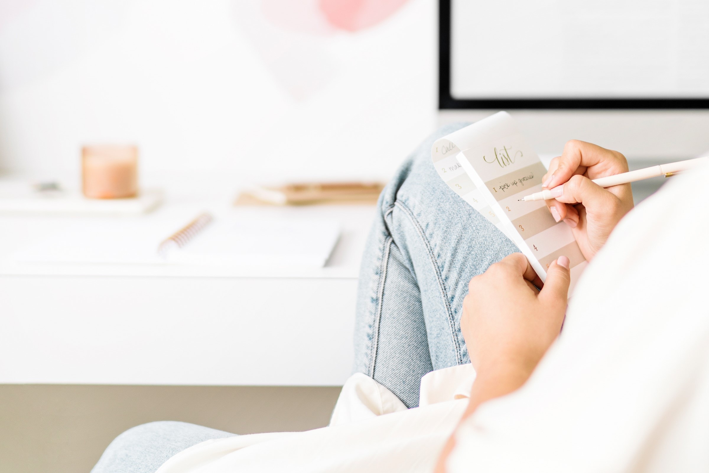 Woman writing a list