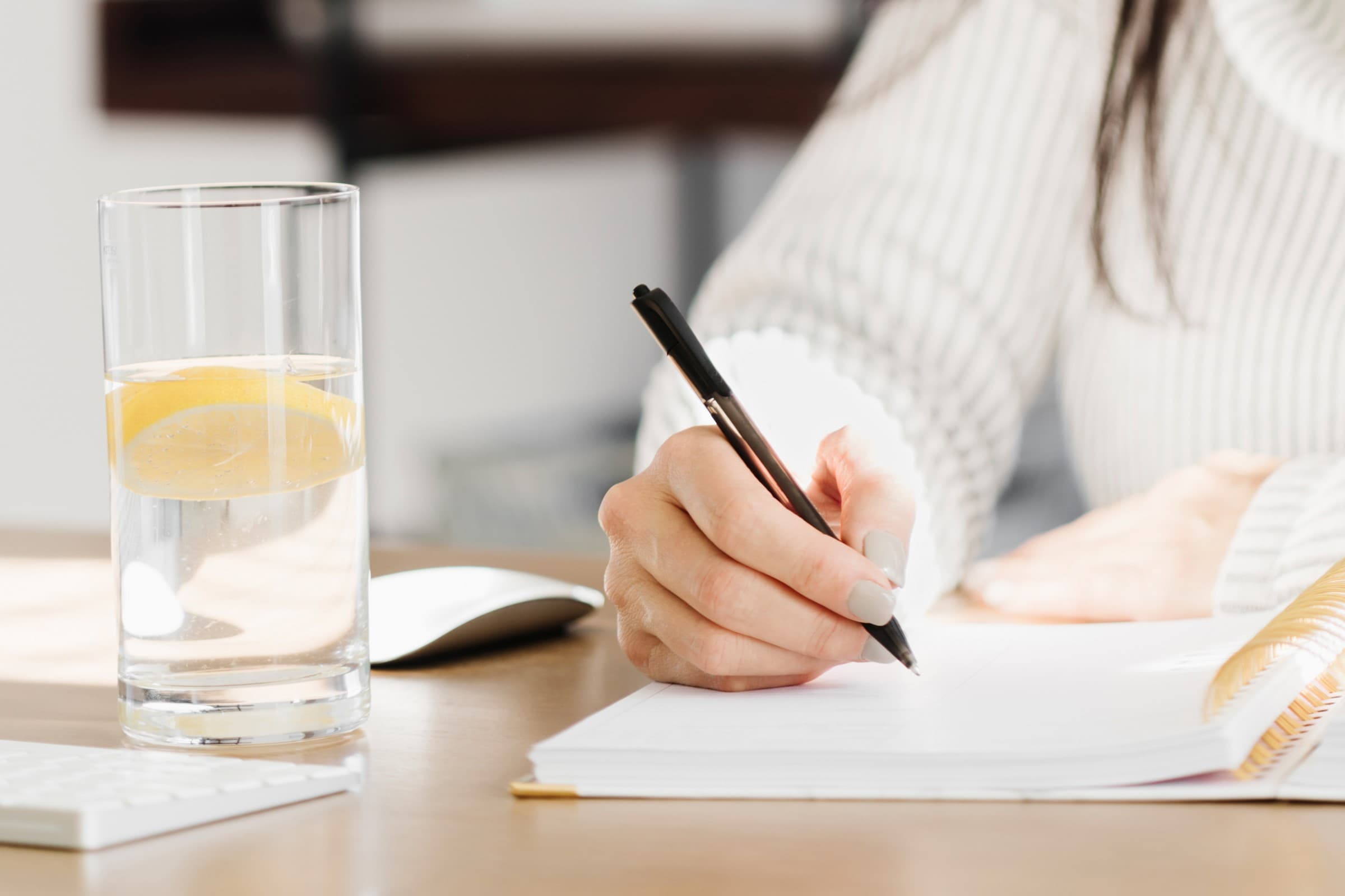 Woman writing in a notebook